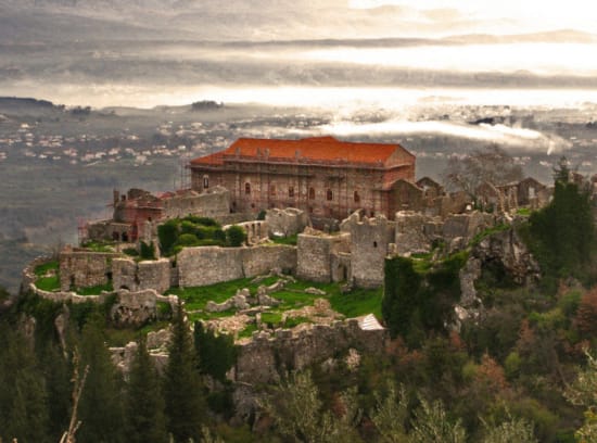 a large building on a hill