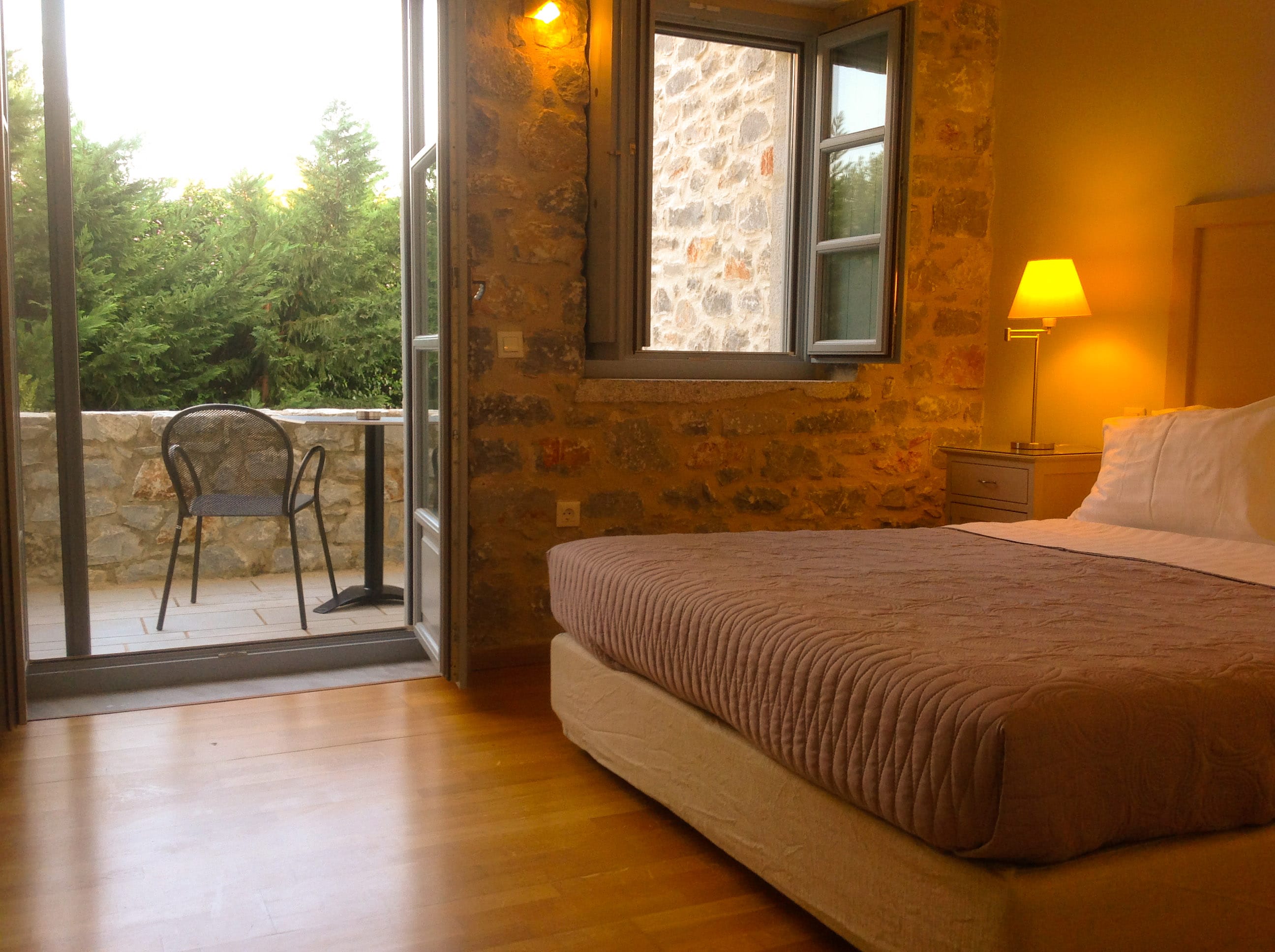 a bedroom with a large window