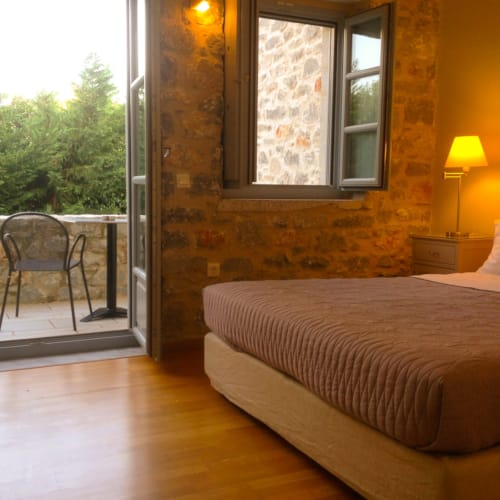 a bedroom with a large window