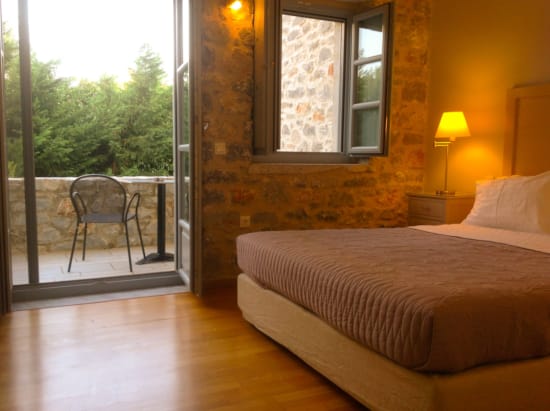 a bedroom with a large window