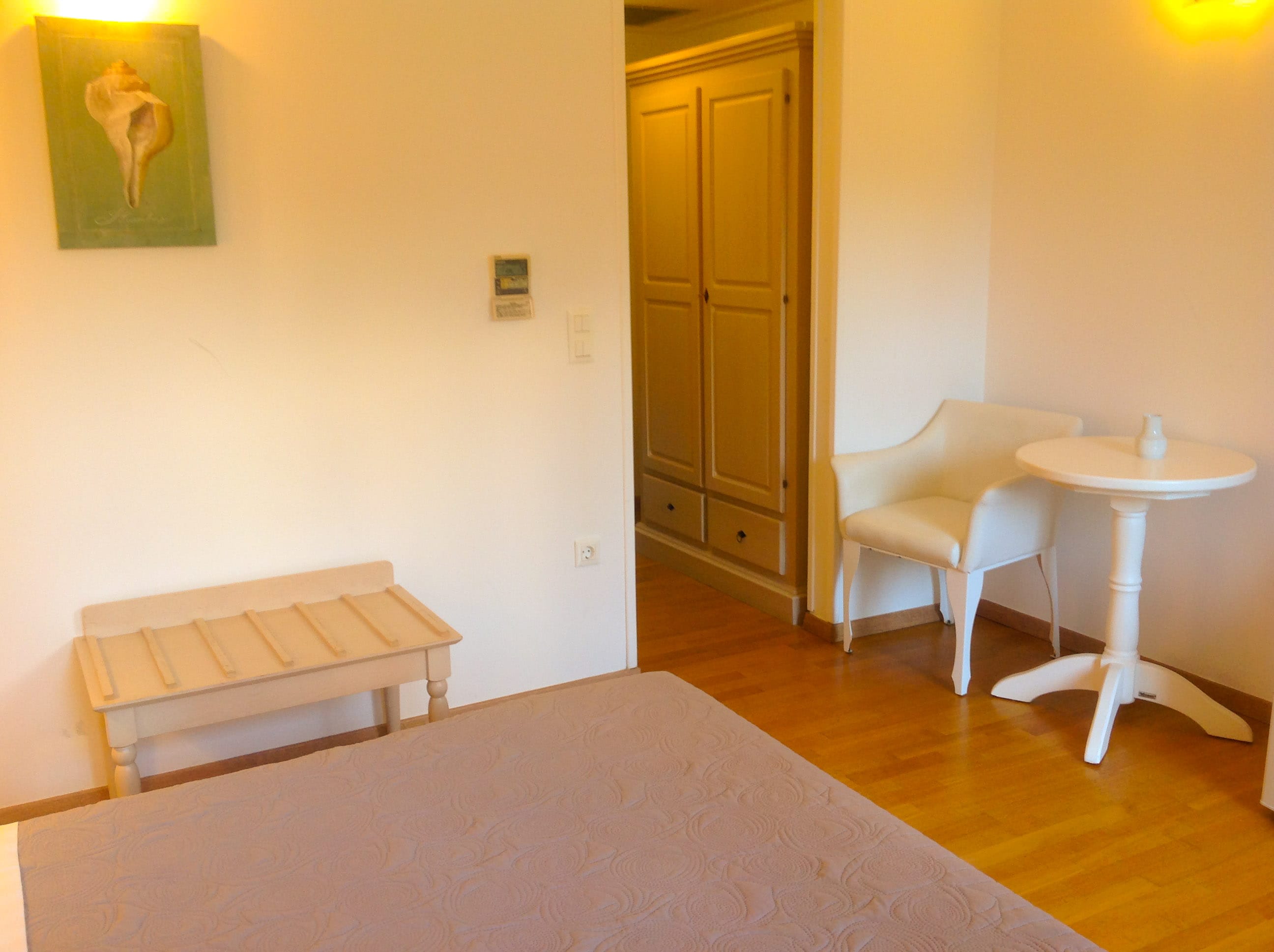 a room with a bench and a table