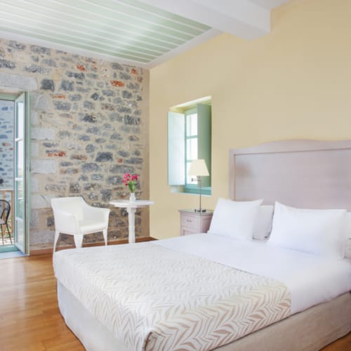 a bedroom with a large bed