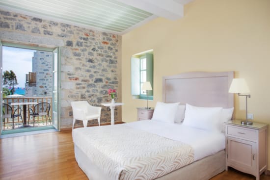 a bedroom with a large bed