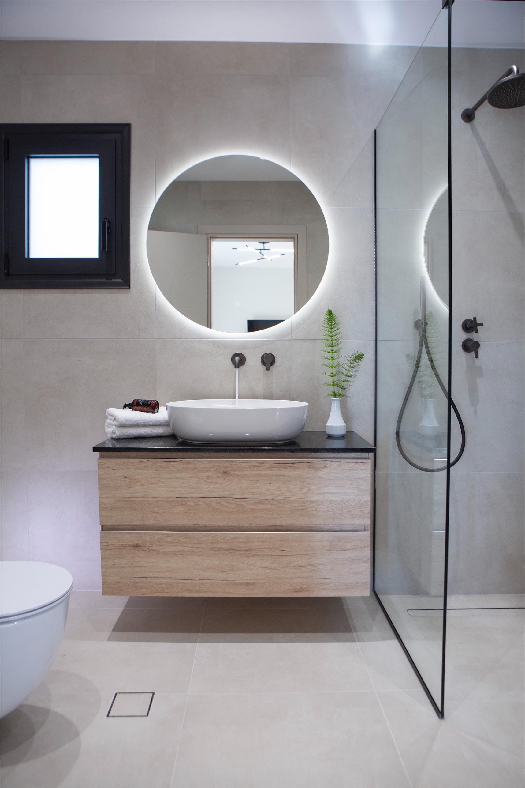 a bathroom with a glass shower