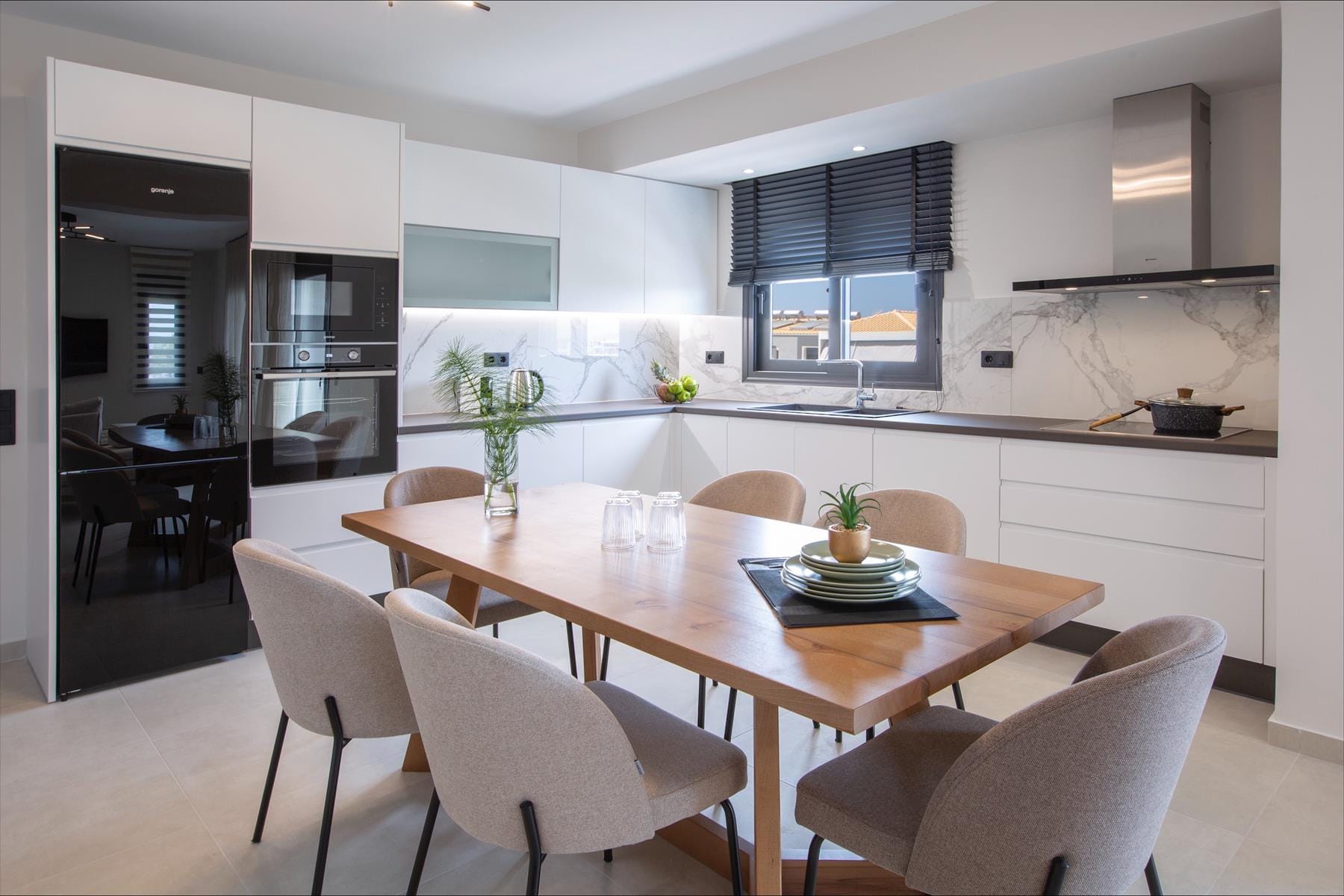 a dining room table with chairs