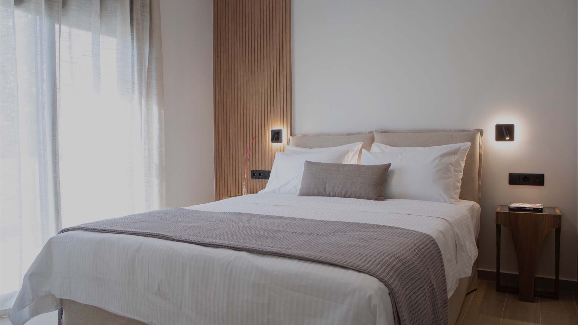 a bed with white sheets