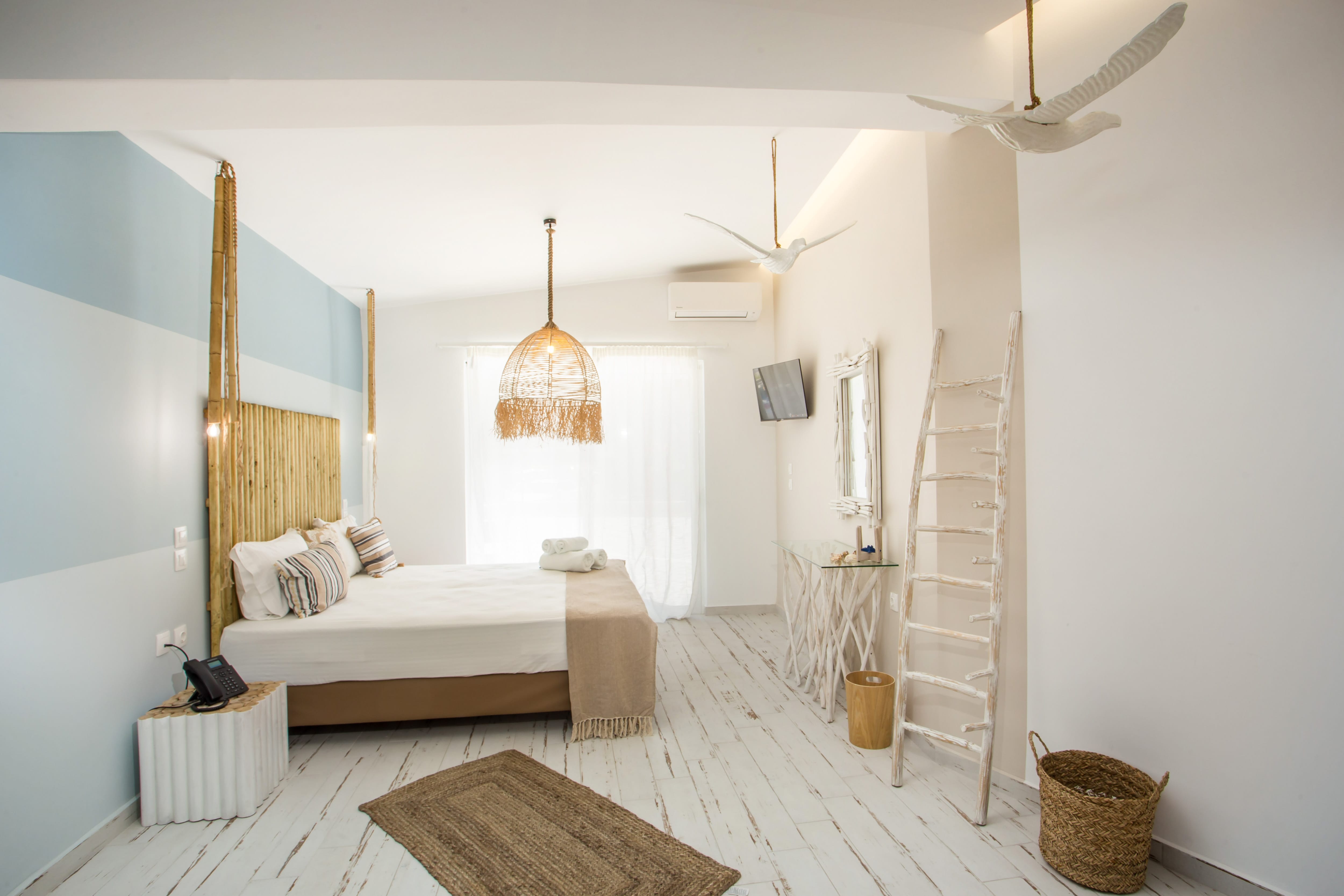 a bedroom with a bed and a staircase