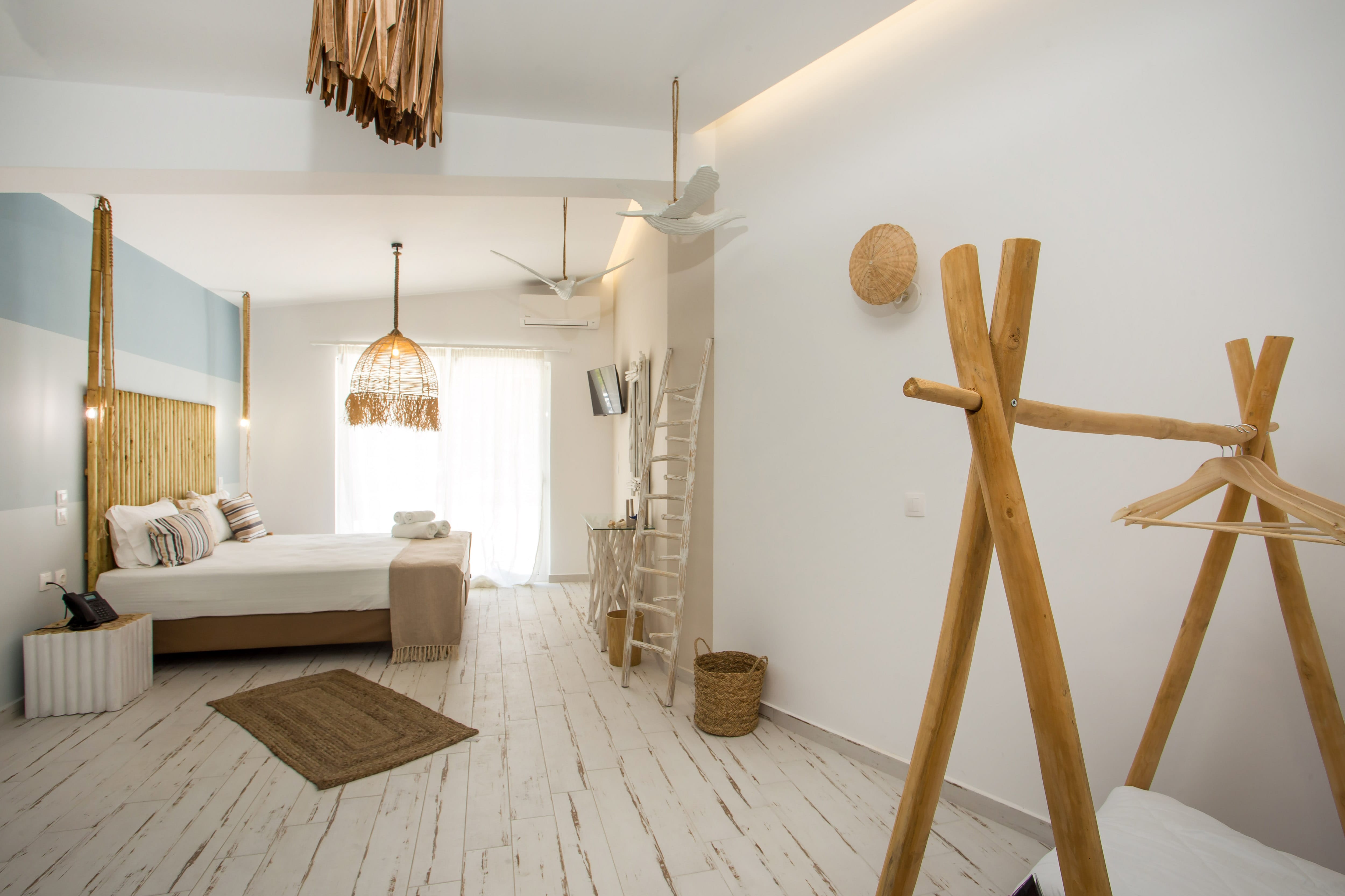 a room with a bed and a lamp