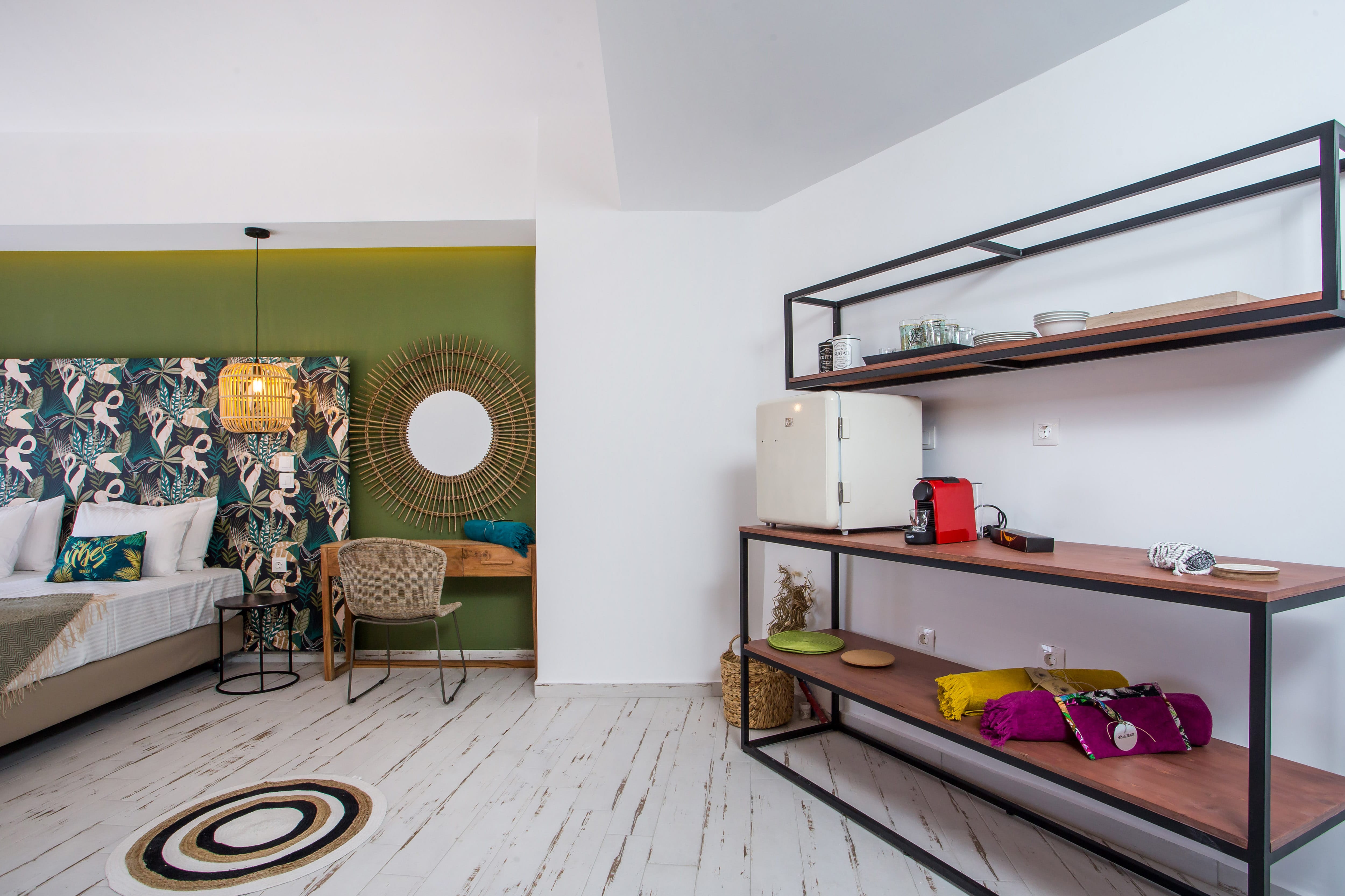 a room with a bed and a desk