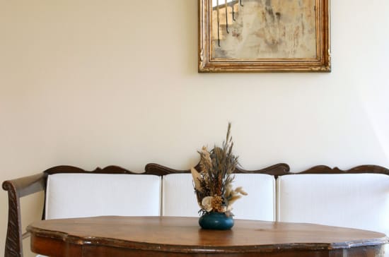 a vase with flowers on a table