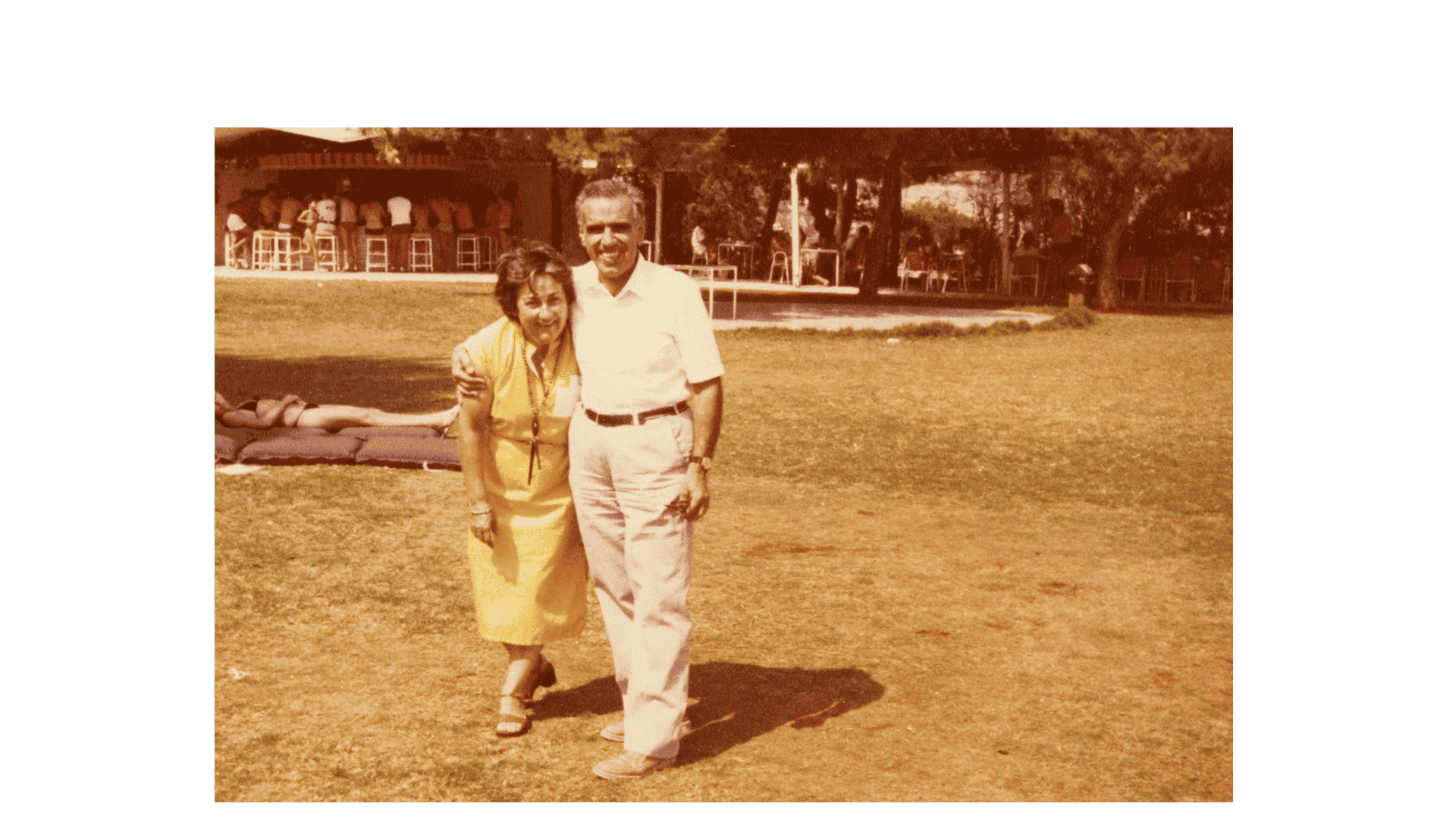 a man and a woman standing on a field