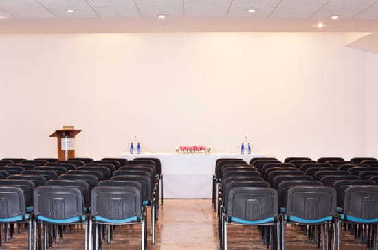 a room with blue chairs