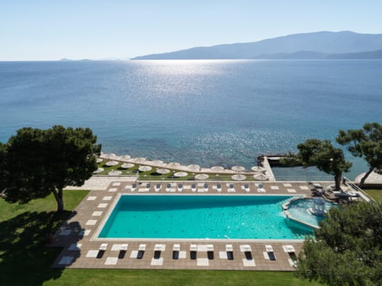 a pool next to a beach