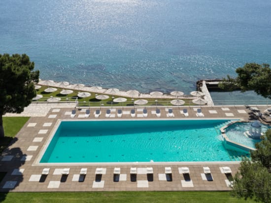 a pool with a building around it