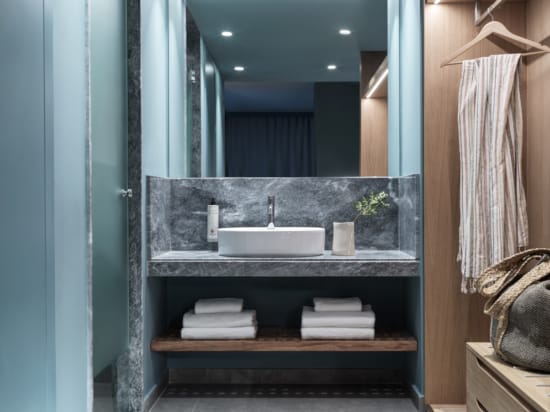 a bathroom with a sink and a mirror