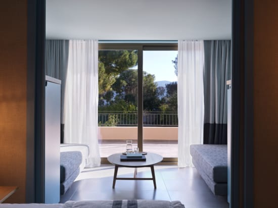 a room with a table and chairs