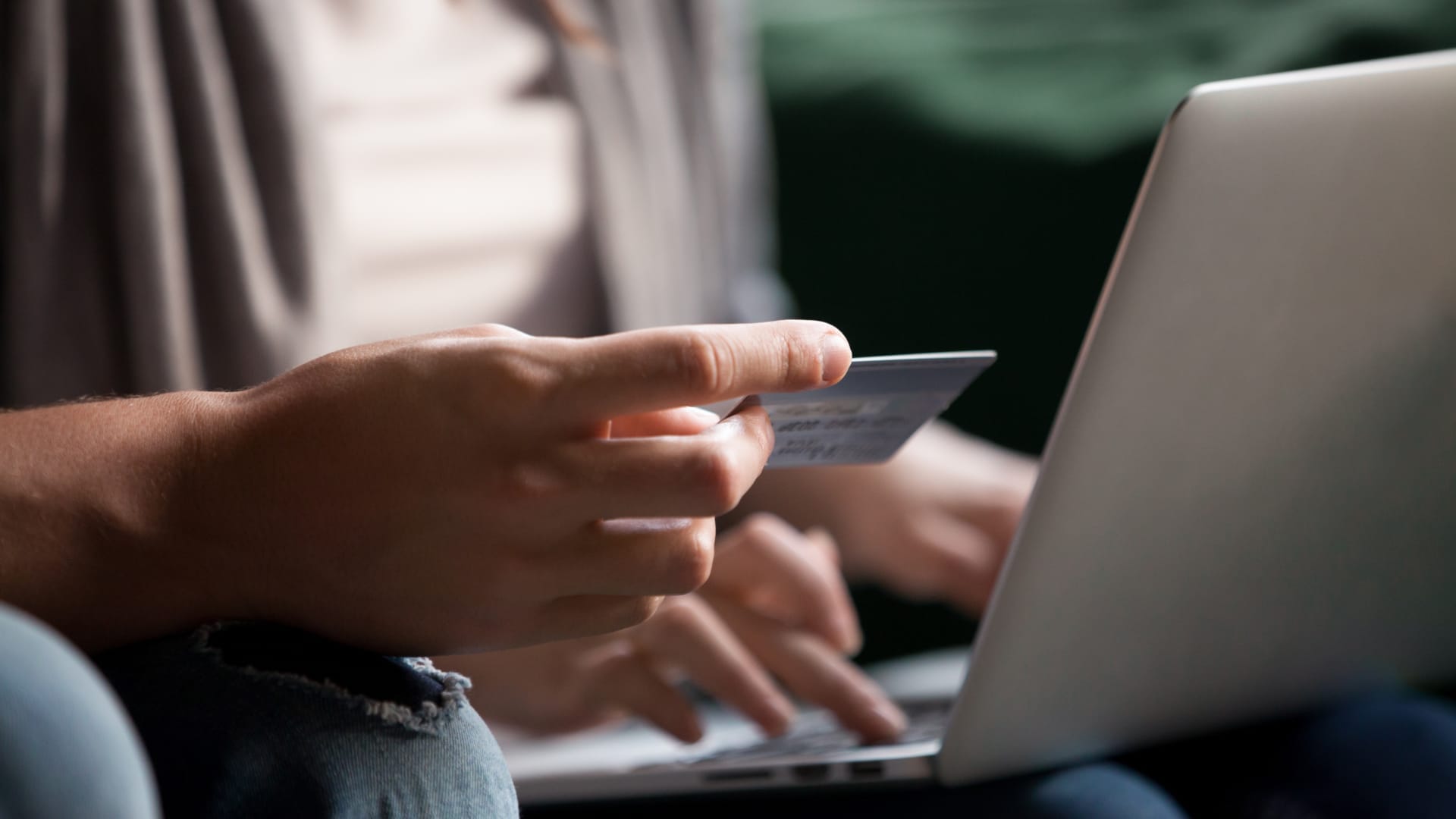 a close-up of hands on a laptop