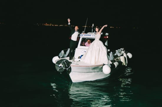 a man and woman on a boat