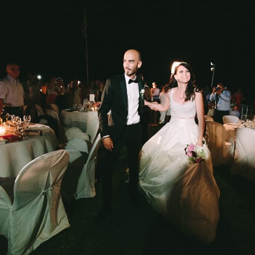 a man and woman in wedding attire
