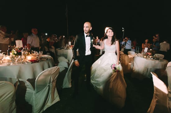 a man and woman in wedding attire