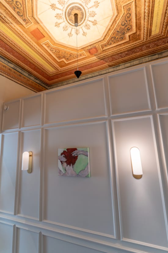a ceiling with a painting on it