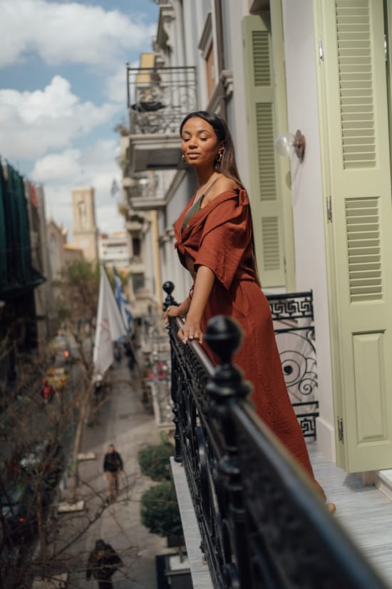 a person standing on a balcony