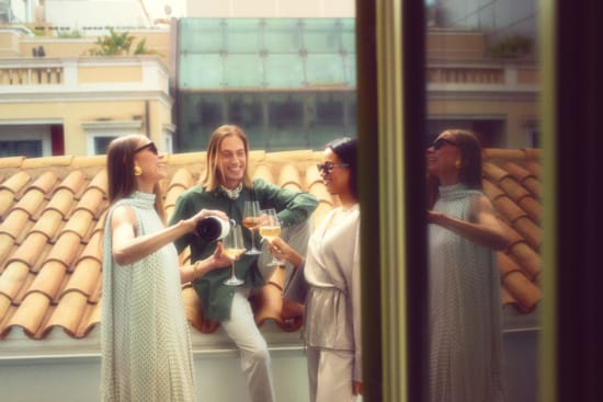 a group of people standing outside a building