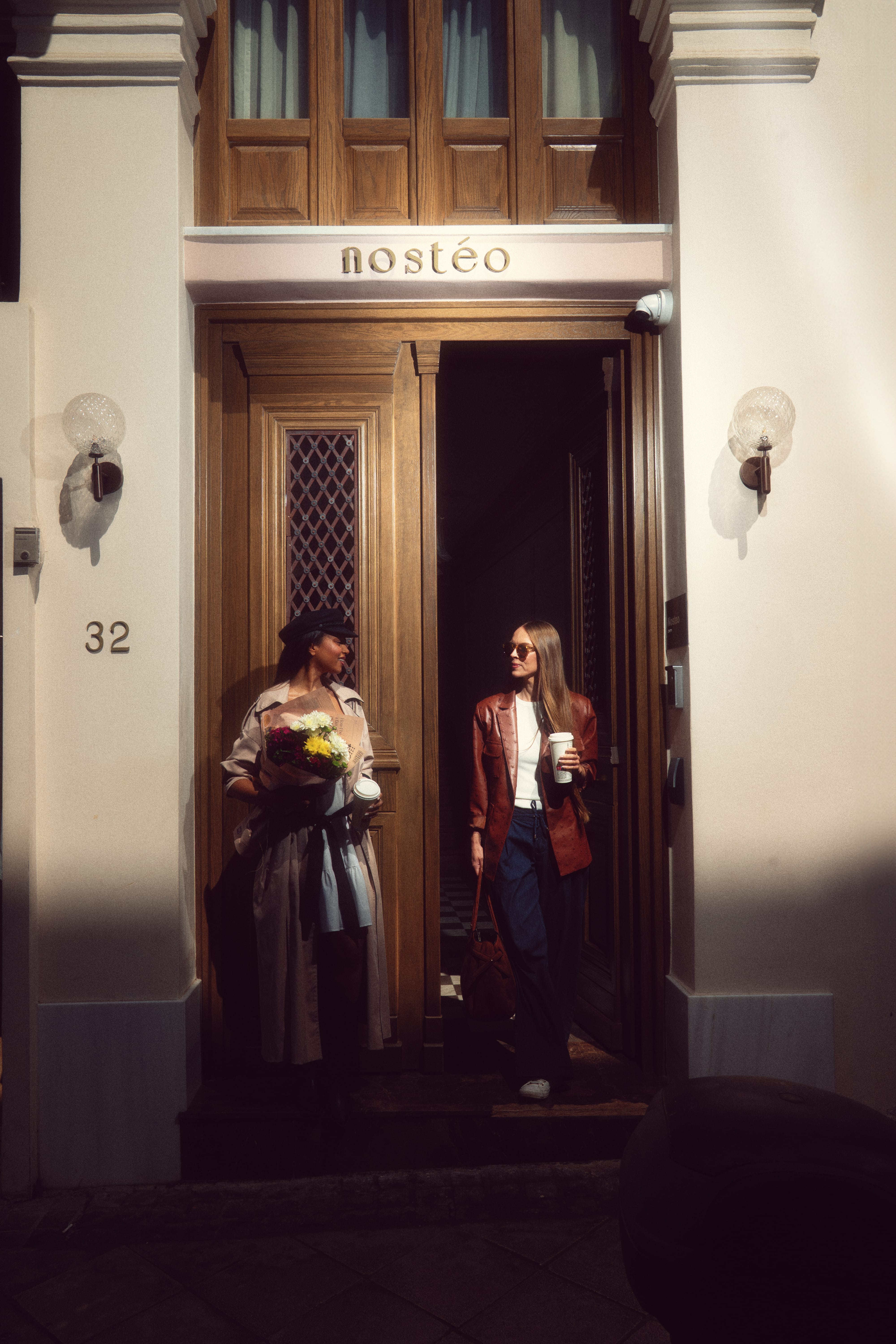 a couple of women standing in a doorway