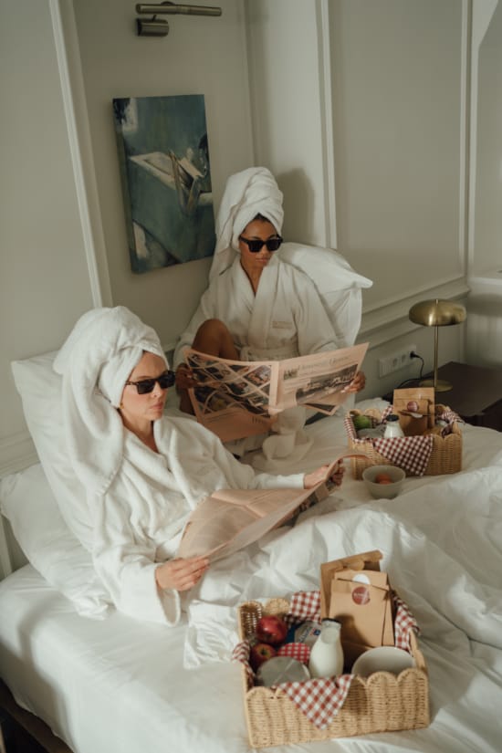 a couple of people in white robes