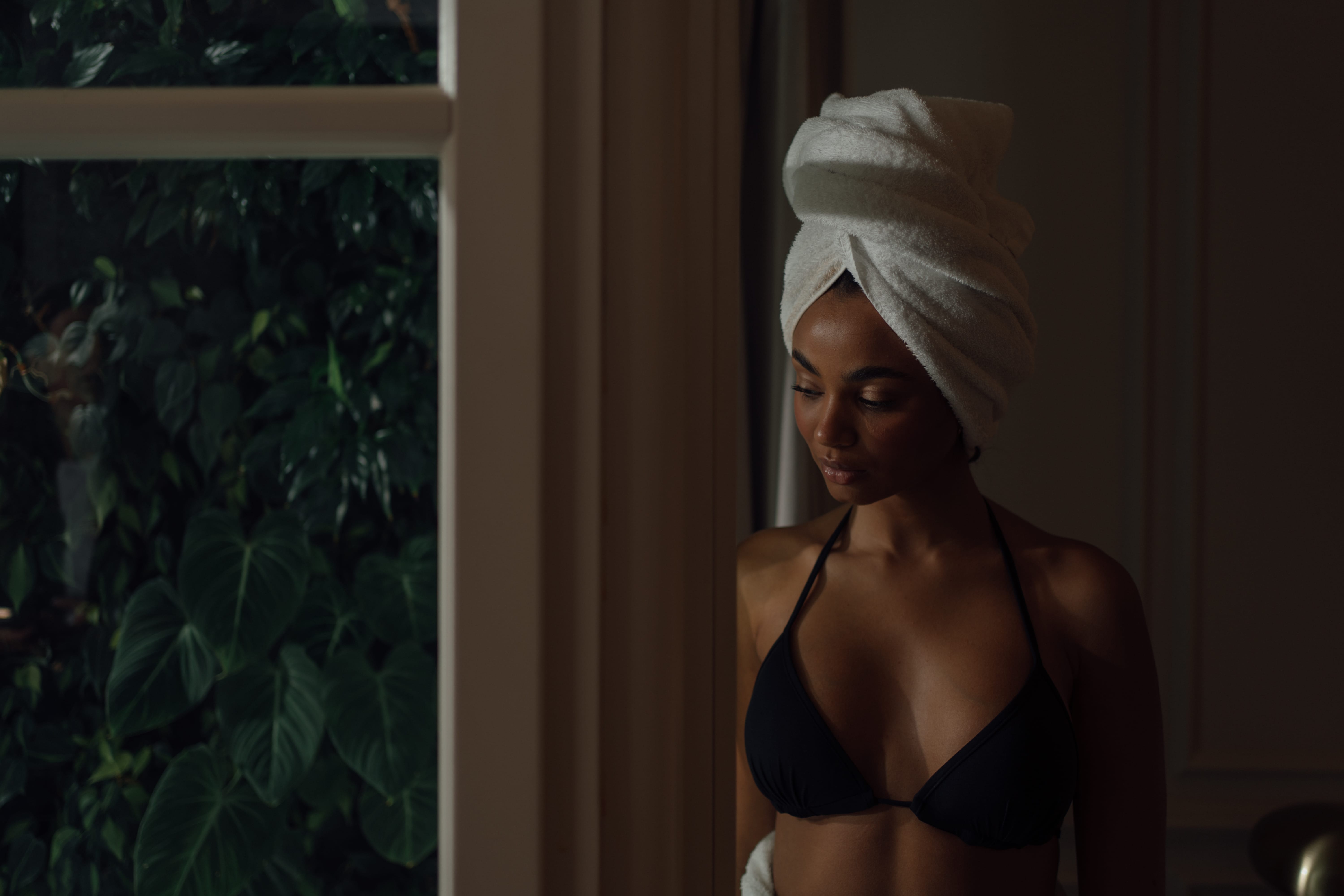 a woman wearing a white hat