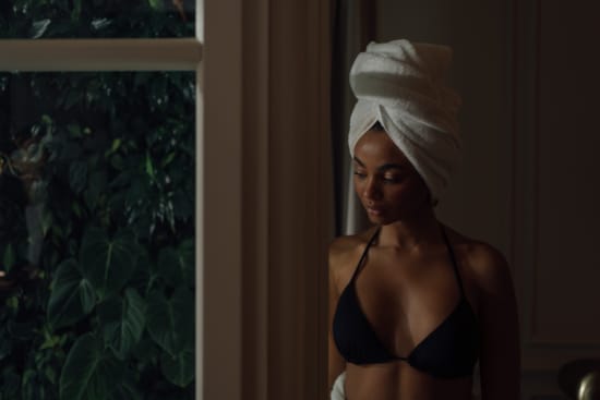 a woman wearing a white hat