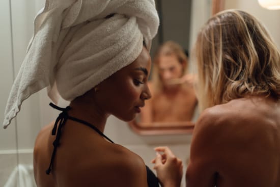 a woman looking at a man