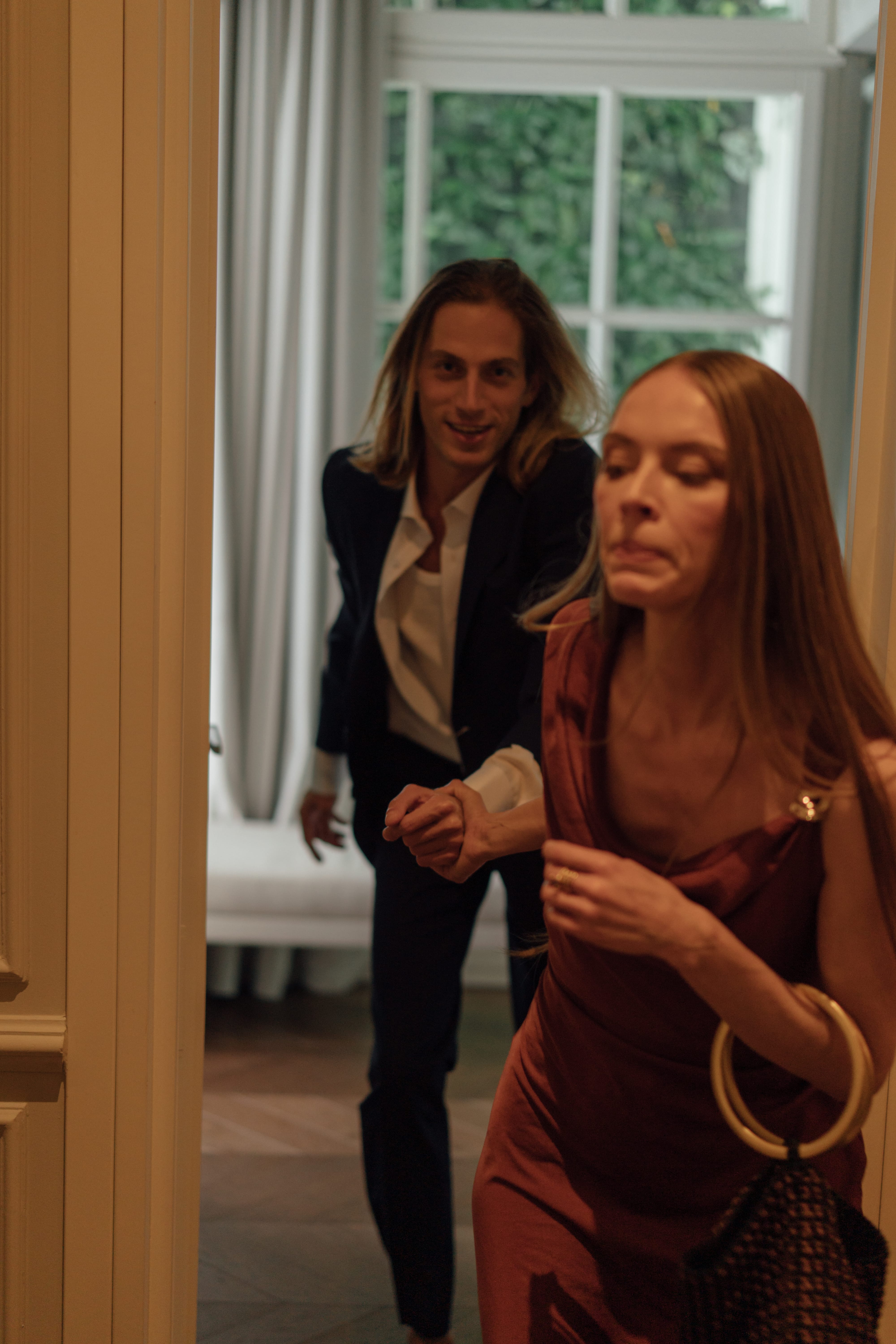 a woman standing next to a woman