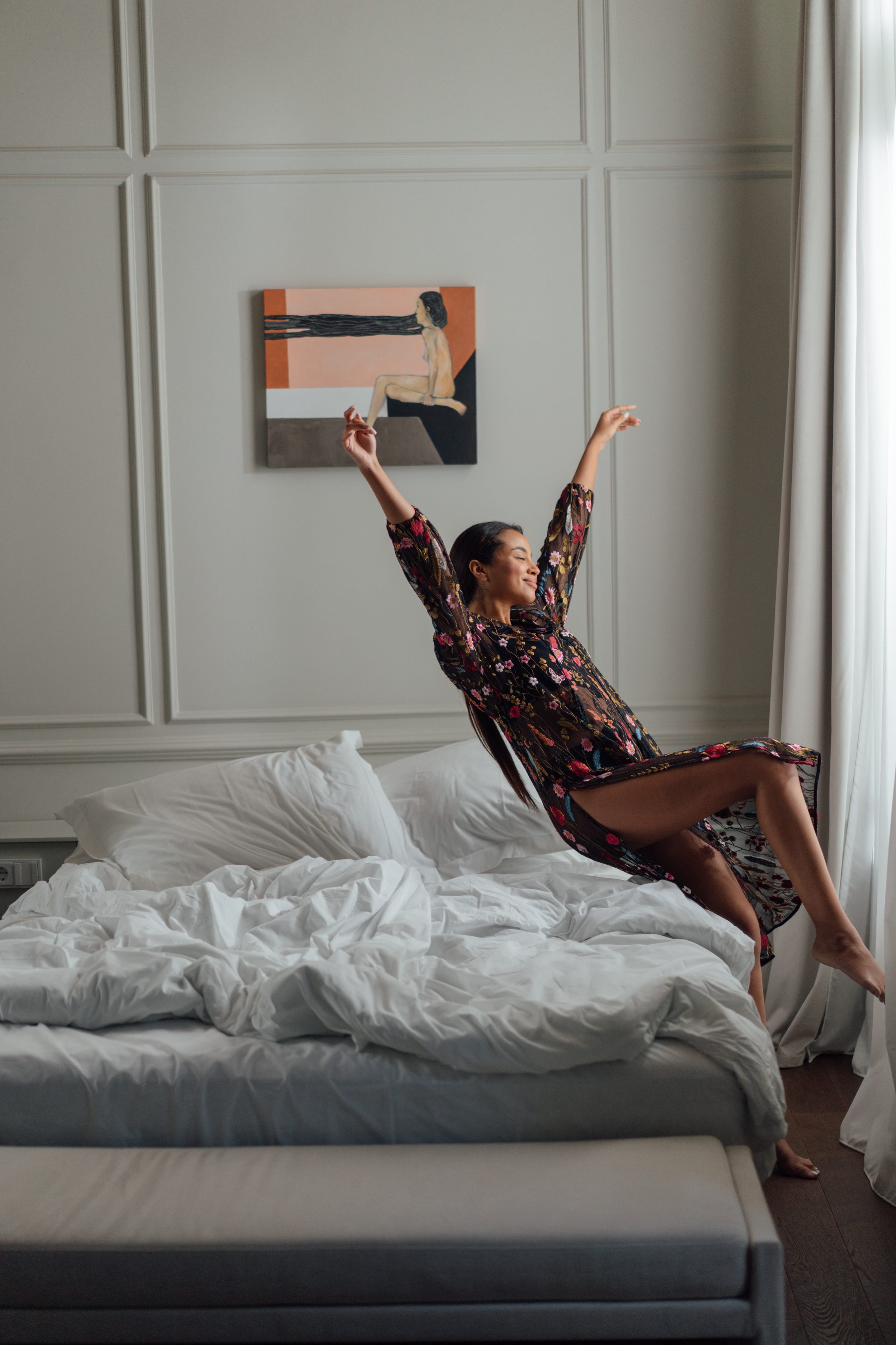 a person sitting on a bed