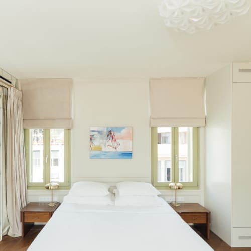 a bedroom with two beds