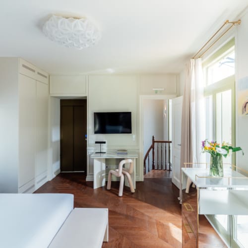 a living room with a tv and a table