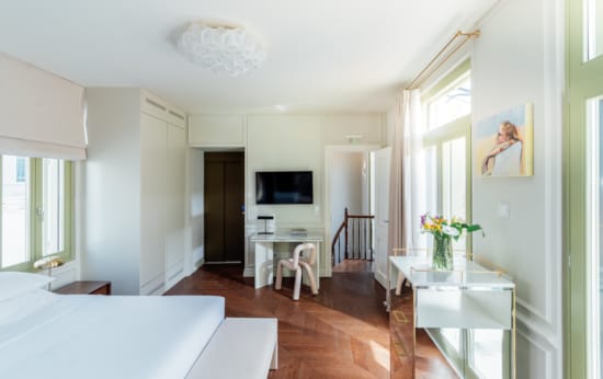 a living room with a tv and a table