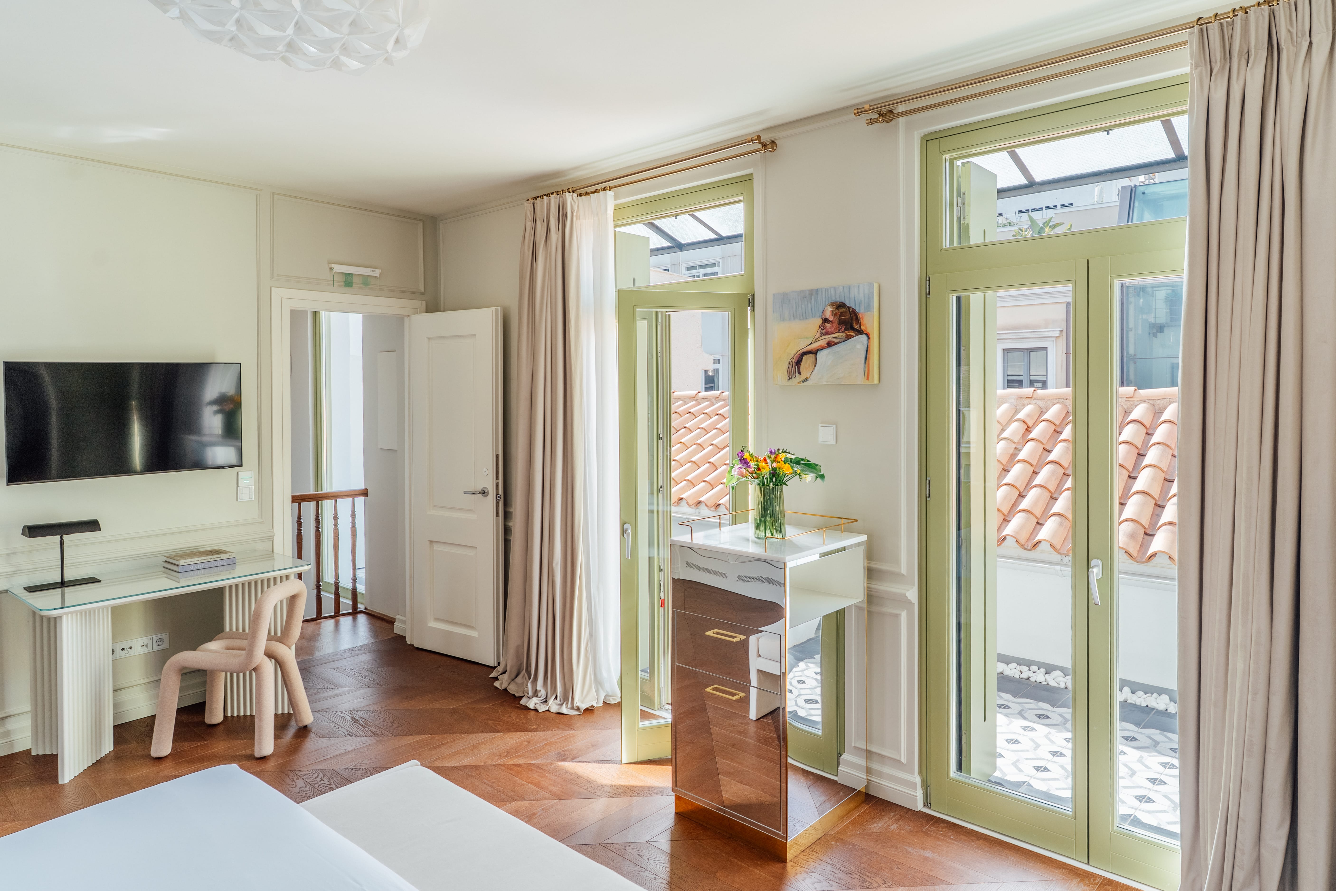 a room with a table and chairs