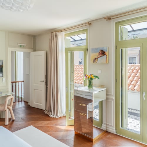 a room with a table and chairs