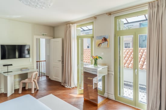 a room with a table and chairs