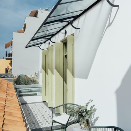a house with a glass front patio