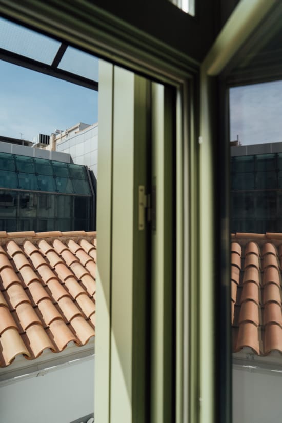 a window with a view of a city