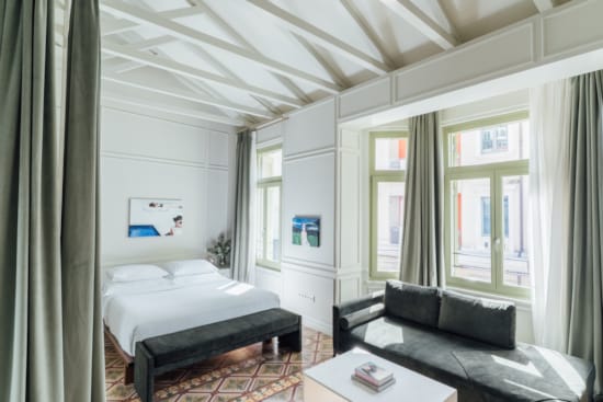 a room with a bed and a couch