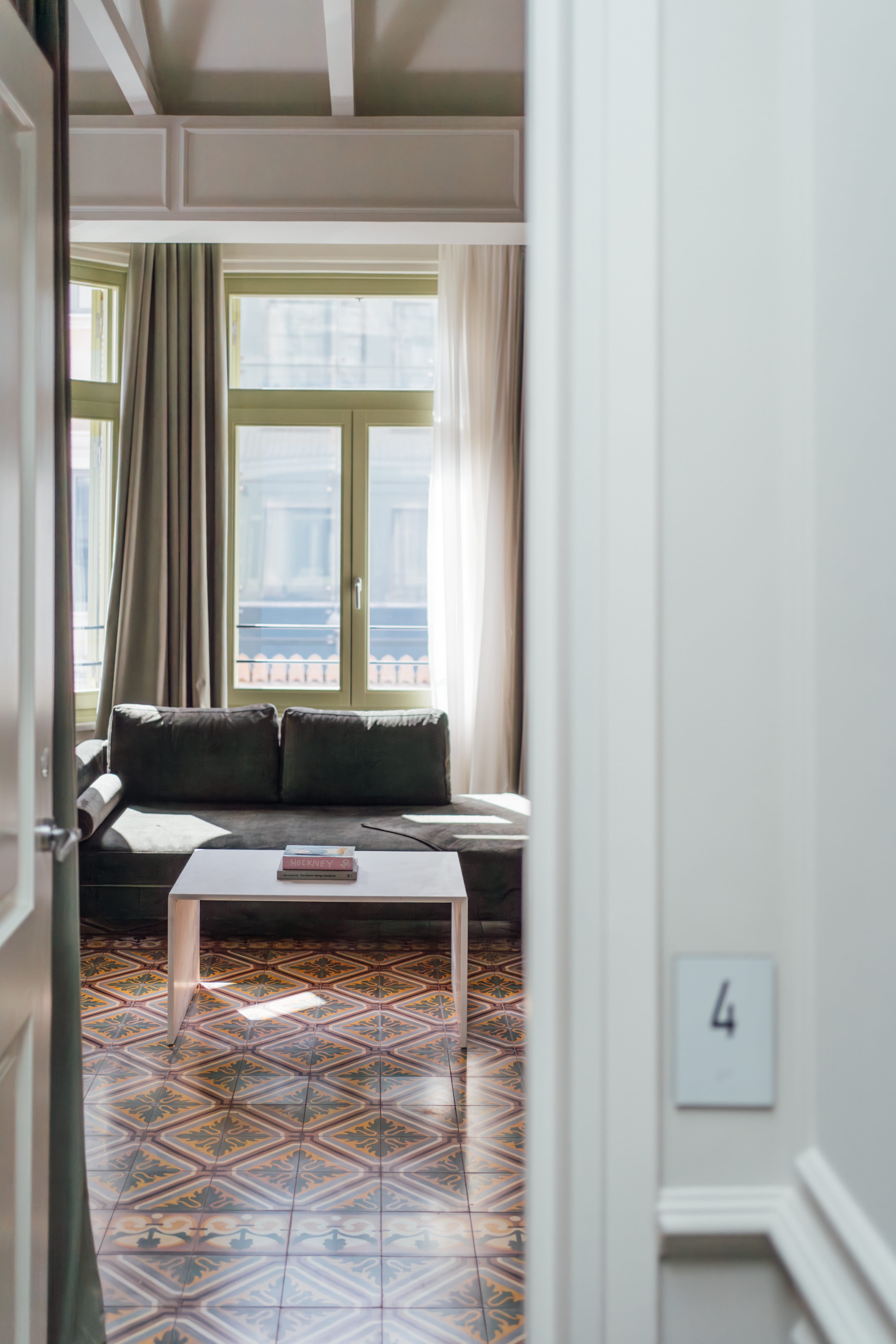 a living room with a couch and a table