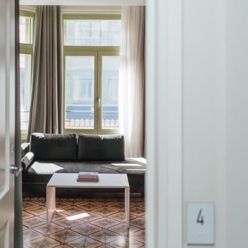 a living room with a couch and a table