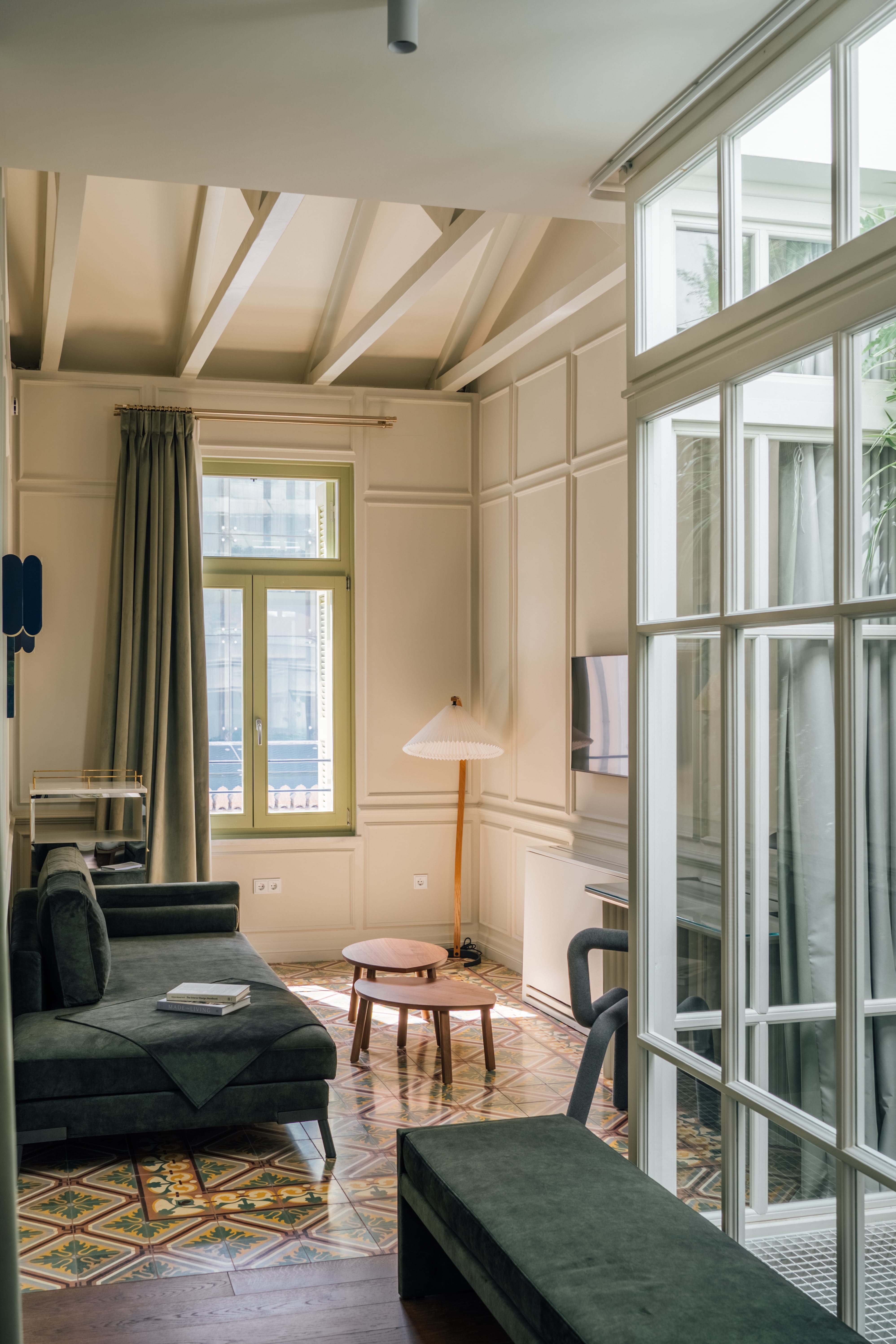 a living room with a glass door