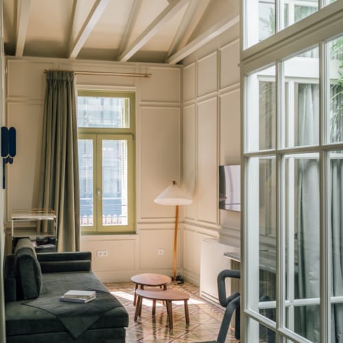 a living room with a glass door