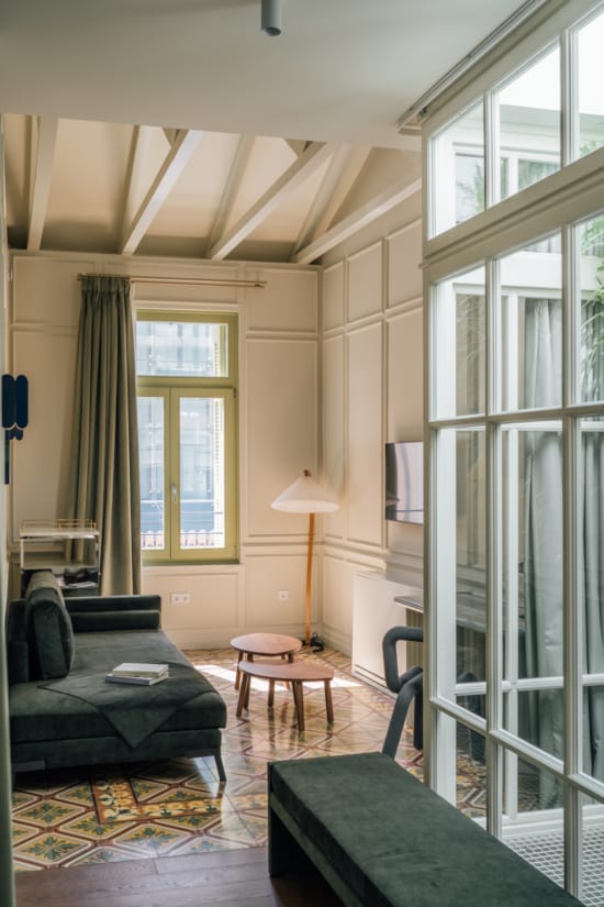 a living room with a glass door