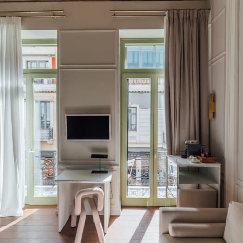 a room with a tv and a table