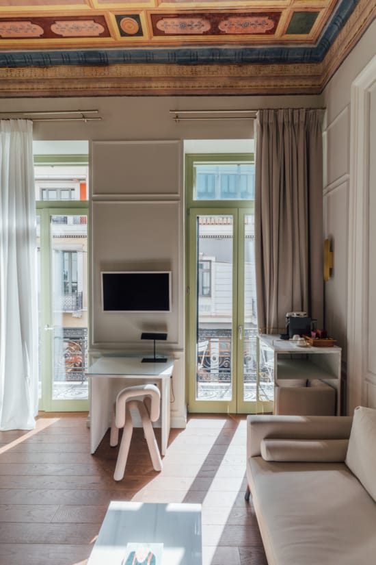 a room with a tv and a table